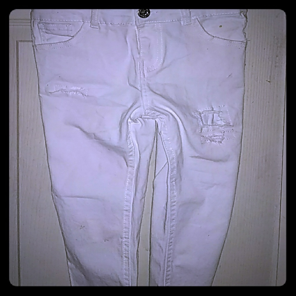 This is a pair of little children's ripped jeans.